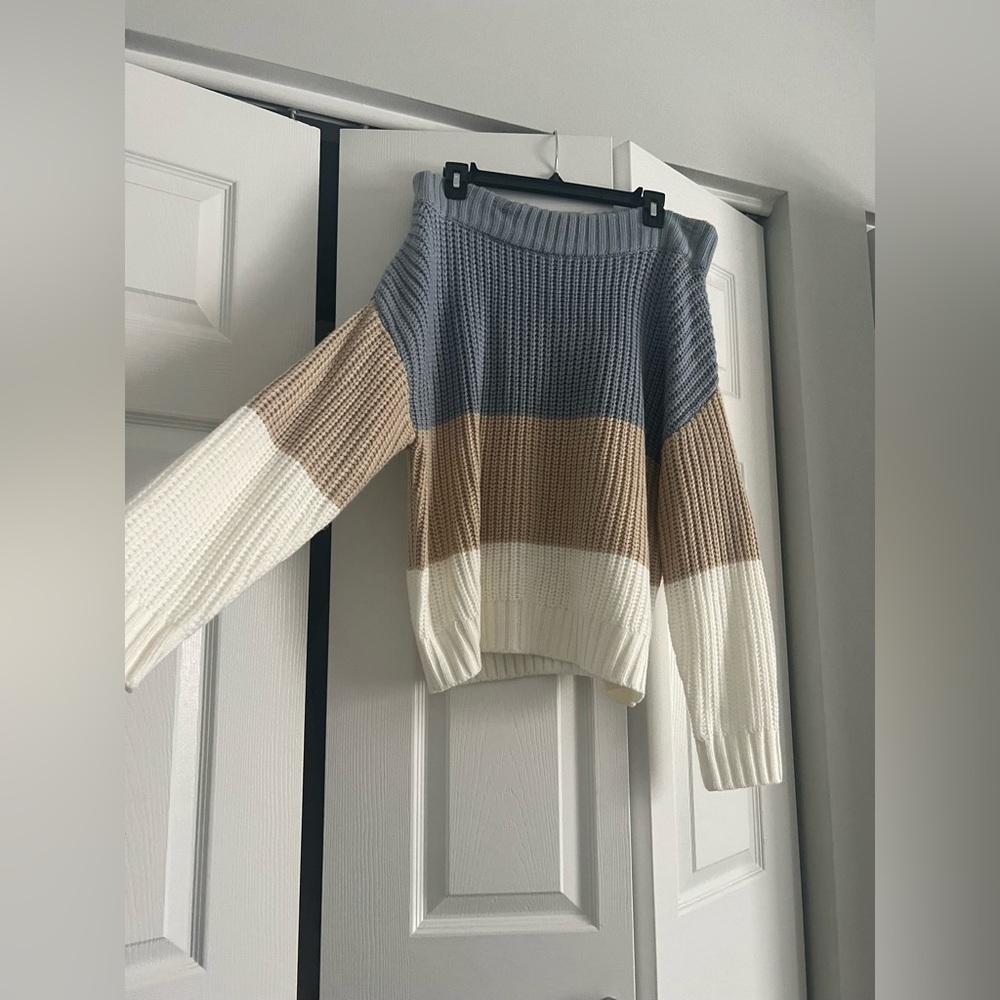 sweater. over the shoulder.